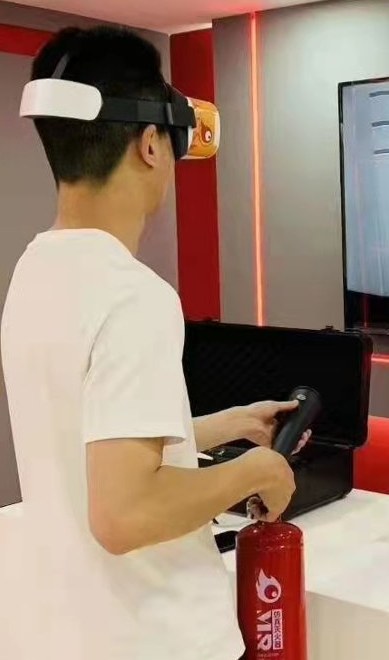 Trainee using a mixed-reality headset with handheld controller